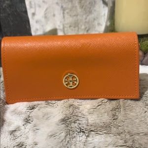 Tory Burch eyeglass case.